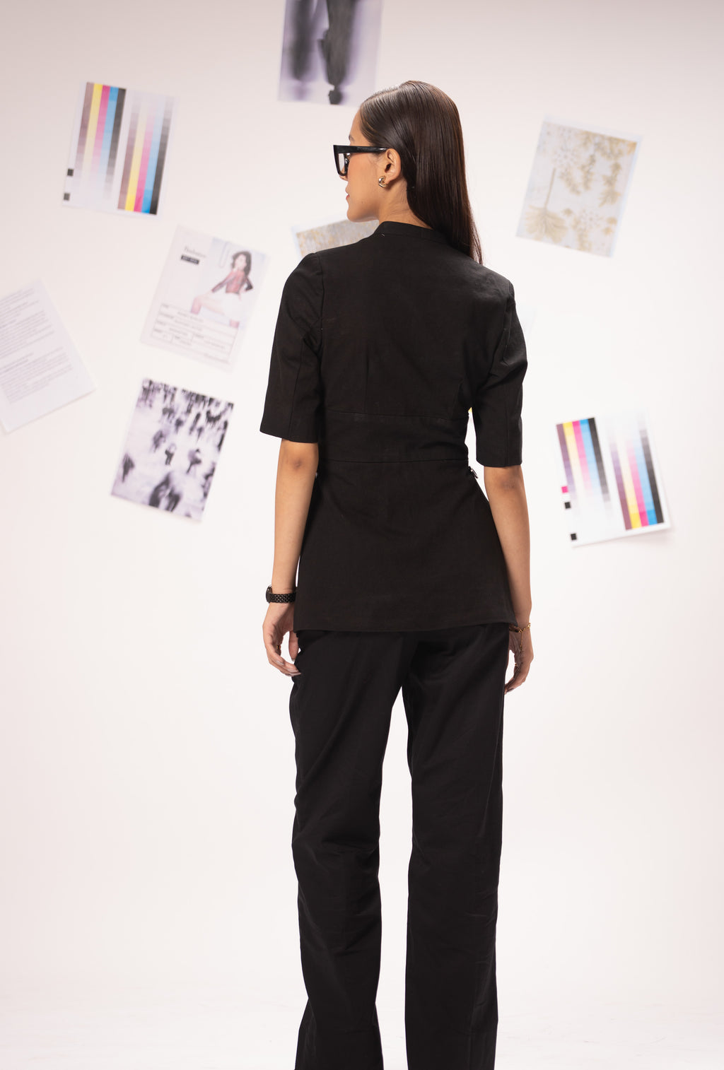 All Hearts No Spades luxury women’s black top with half sleeves, shoulder pads and minimalist tailoring – quiet luxury premium clothing.