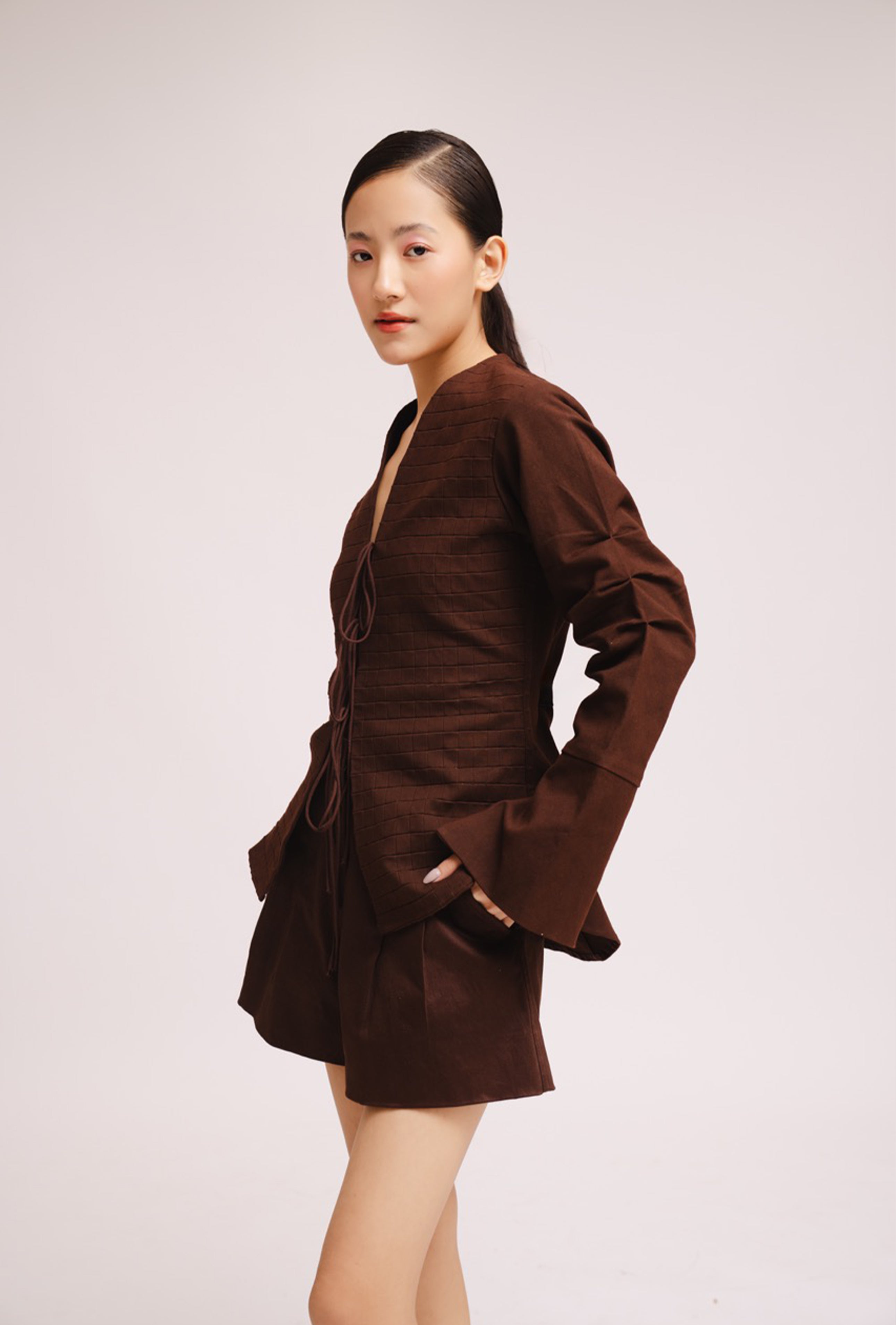 Luxury women’s brown tie up top with bell sleeves and front opening – All Hearts No Spades quiet luxury minimalist clothing