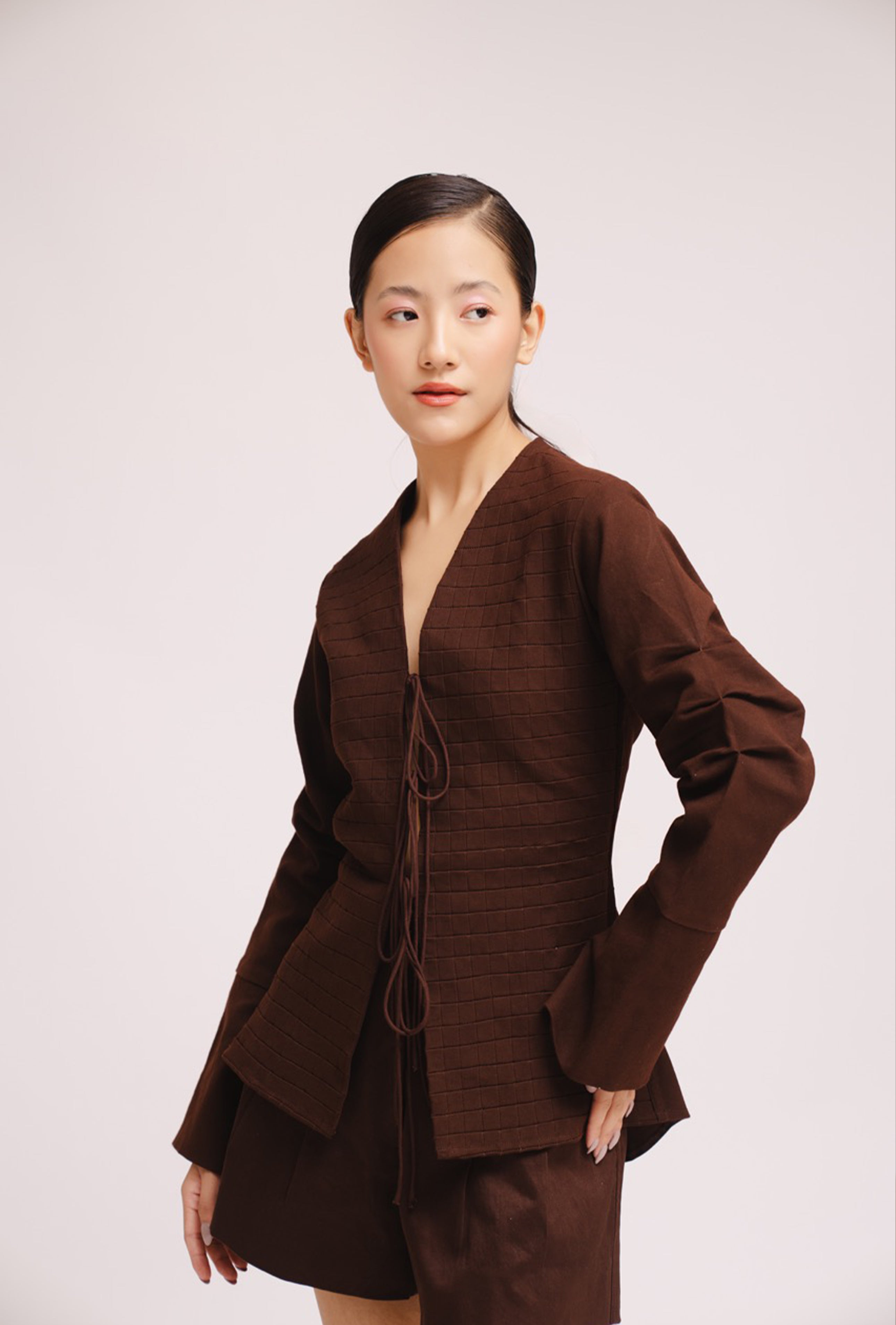 Luxury women’s brown tie up top with bell sleeves and front opening – All Hearts No Spades quiet luxury minimalist clothing